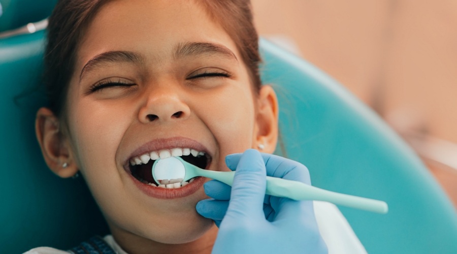 Young girl smiling during dental checkup in Southampton